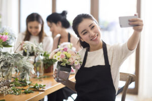 young chinese women learning flower arrangement